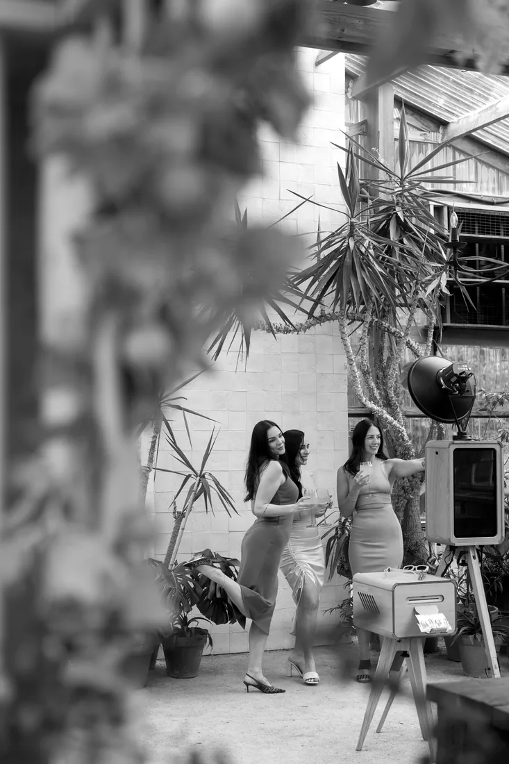 Guests at a Hill Country photo booth